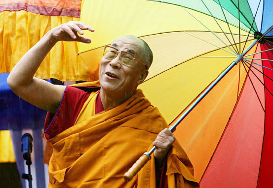 PICTURES OF THE YEAR 2006 Tibetan spiritual leader, the Dalai Lama, waves to the crowd during the inauguration of the Thupten Shedrub Ling temple on the outskirts of Huy, Belgium, May 29, 2006. REUTERS/Thierry Roge BELGIUM DALAI LAMA